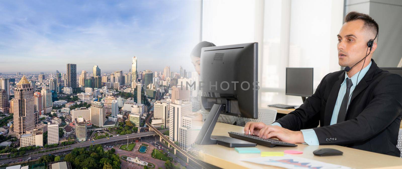 Business people wearing headset working in office broaden view by biancoblue