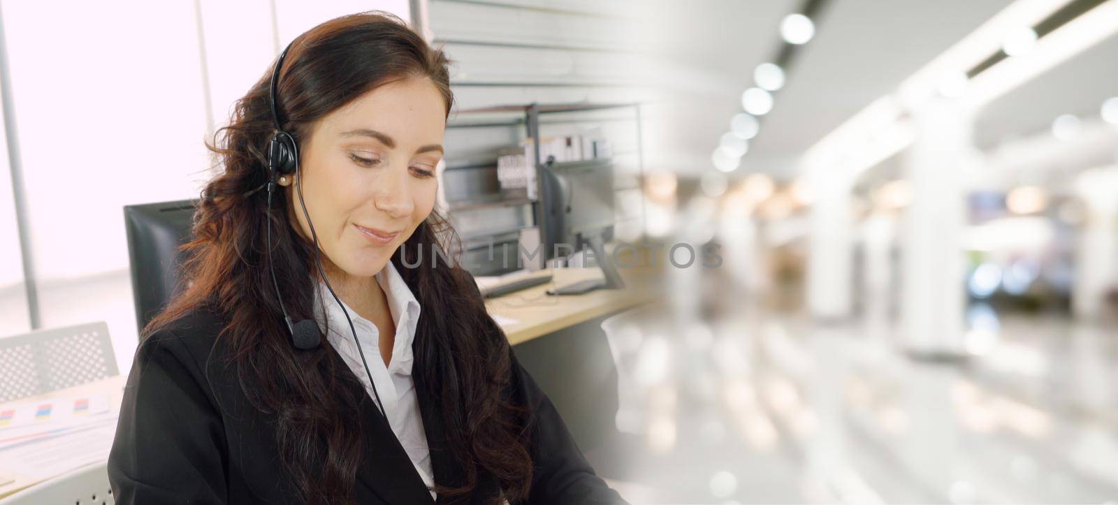 Business people wearing headset working in office to support remote customer or colleague. Call center, telemarketing, customer support agent provide service in broaden view .