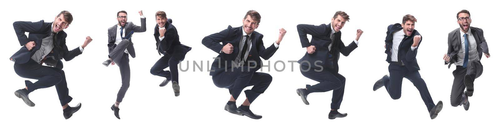 in full growth. two cheerful dancing business people. isolated on white background.
