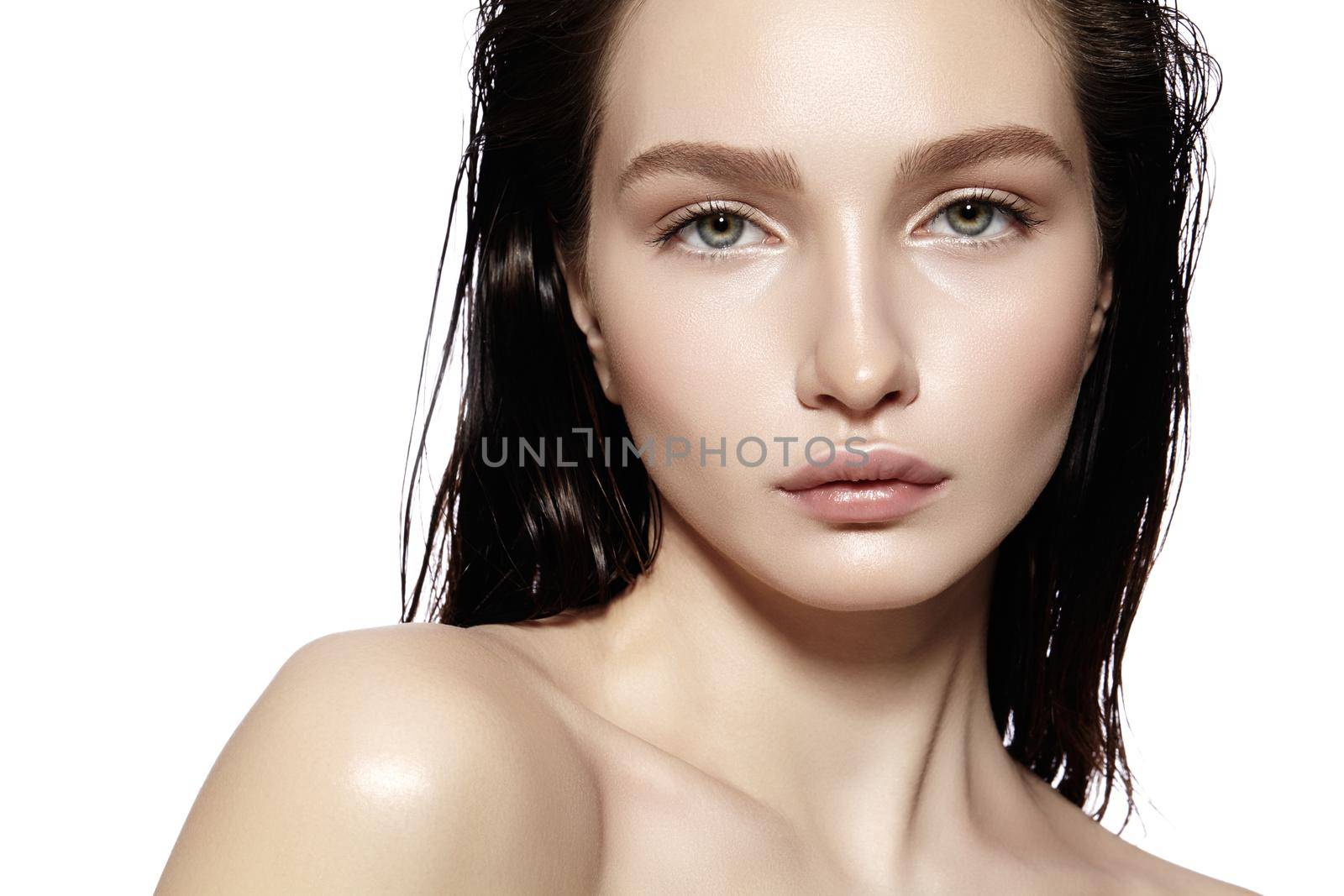 Beautiful Face of young Woman. Skincare, Wellness, Spa. Clean soft Skin, Fresh look. Natural daily makeup, wet hair by MarinaFrost