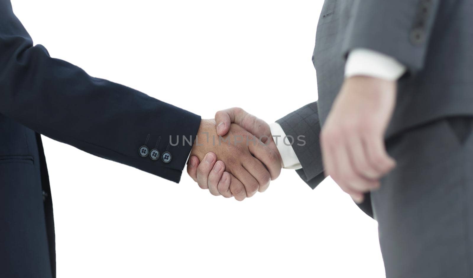 Successful business people handshaking after good deal.