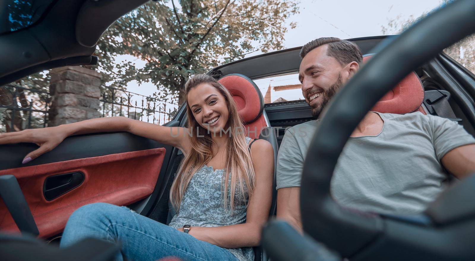 close up.loving couple enjoying a trip in the car.