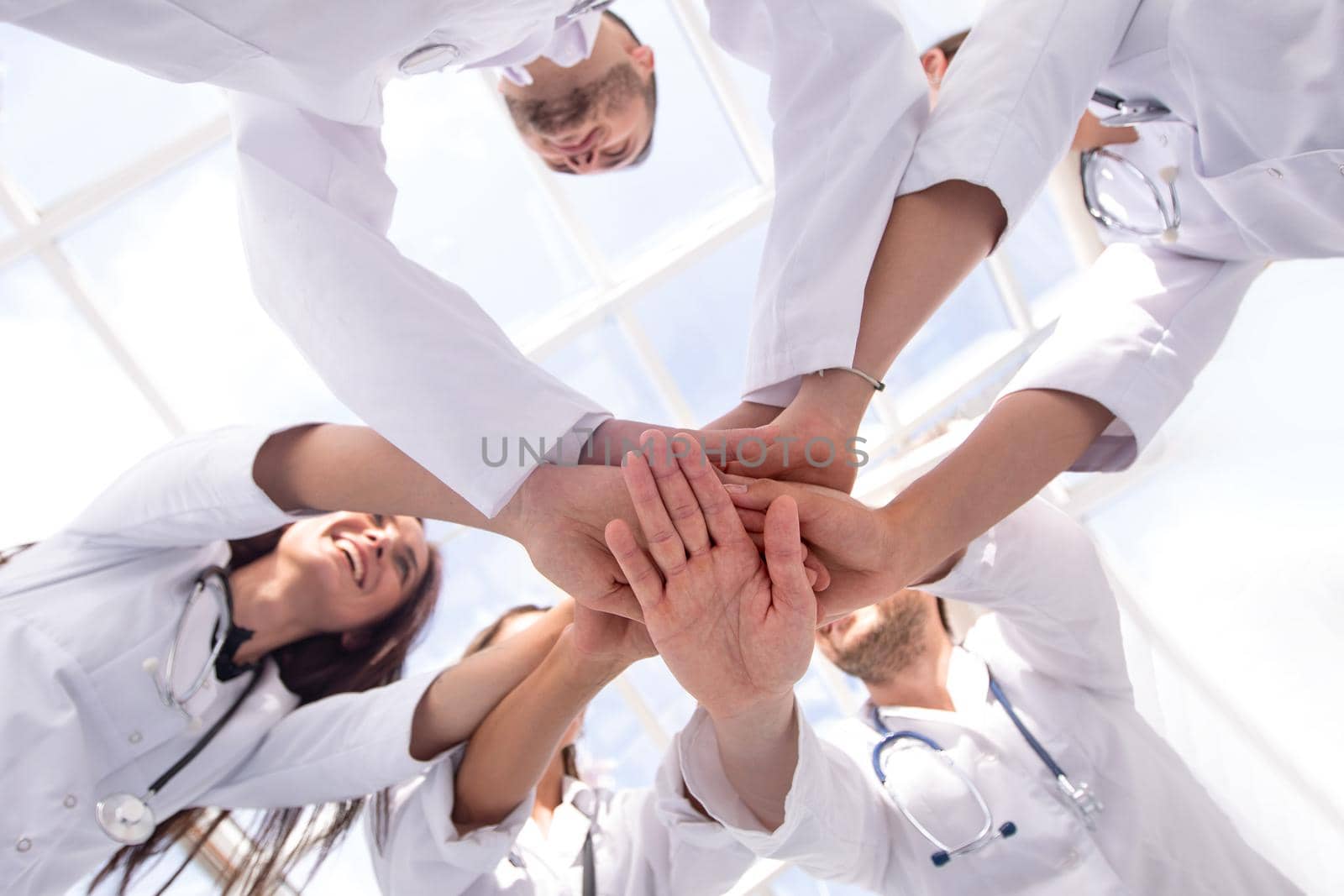 group of diverse medical professionals showing their unity. by asdf