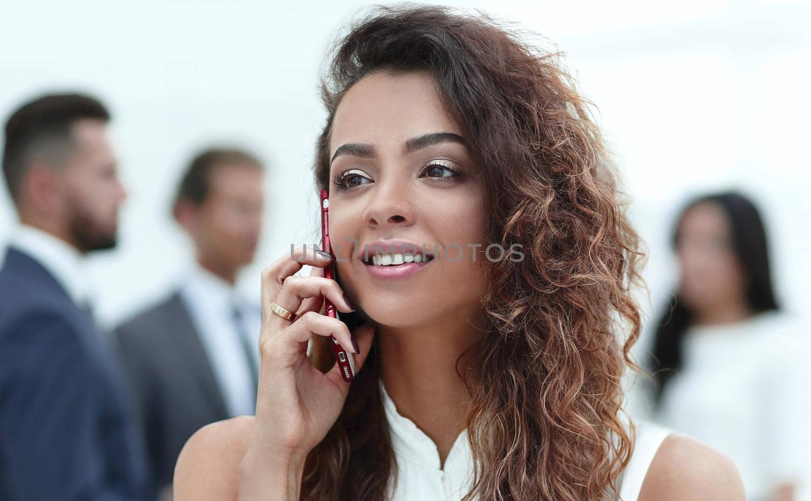 closeup. business woman with a smartphone by asdf