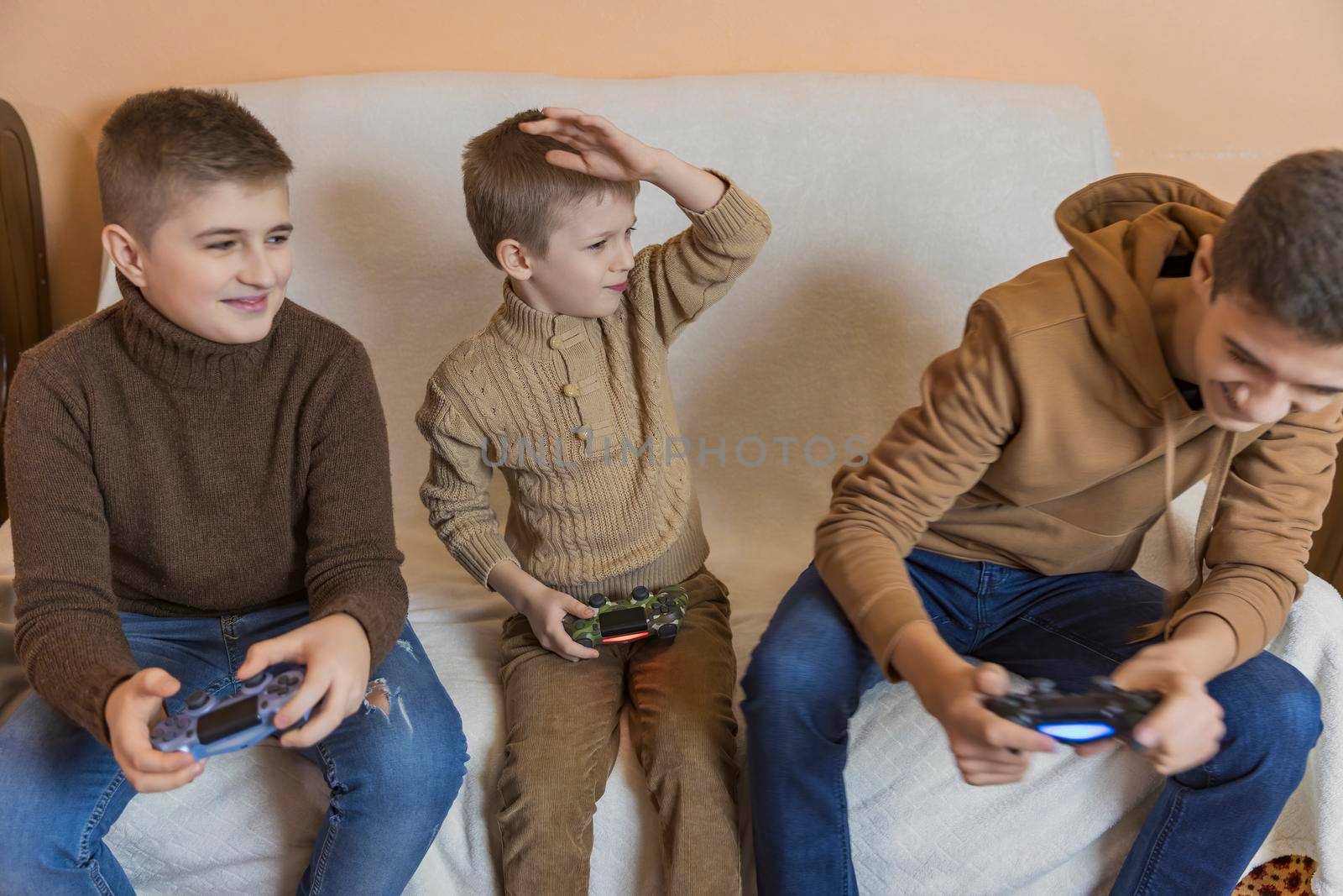 children playing console with joysticks