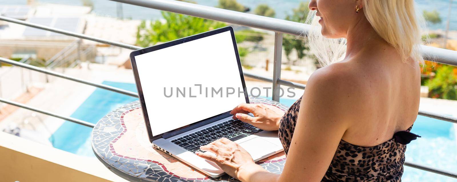 computer screen blank mockup. hand work using laptop with white background for advertising, contact business search information on desk. marketing and creative design by Andelov13