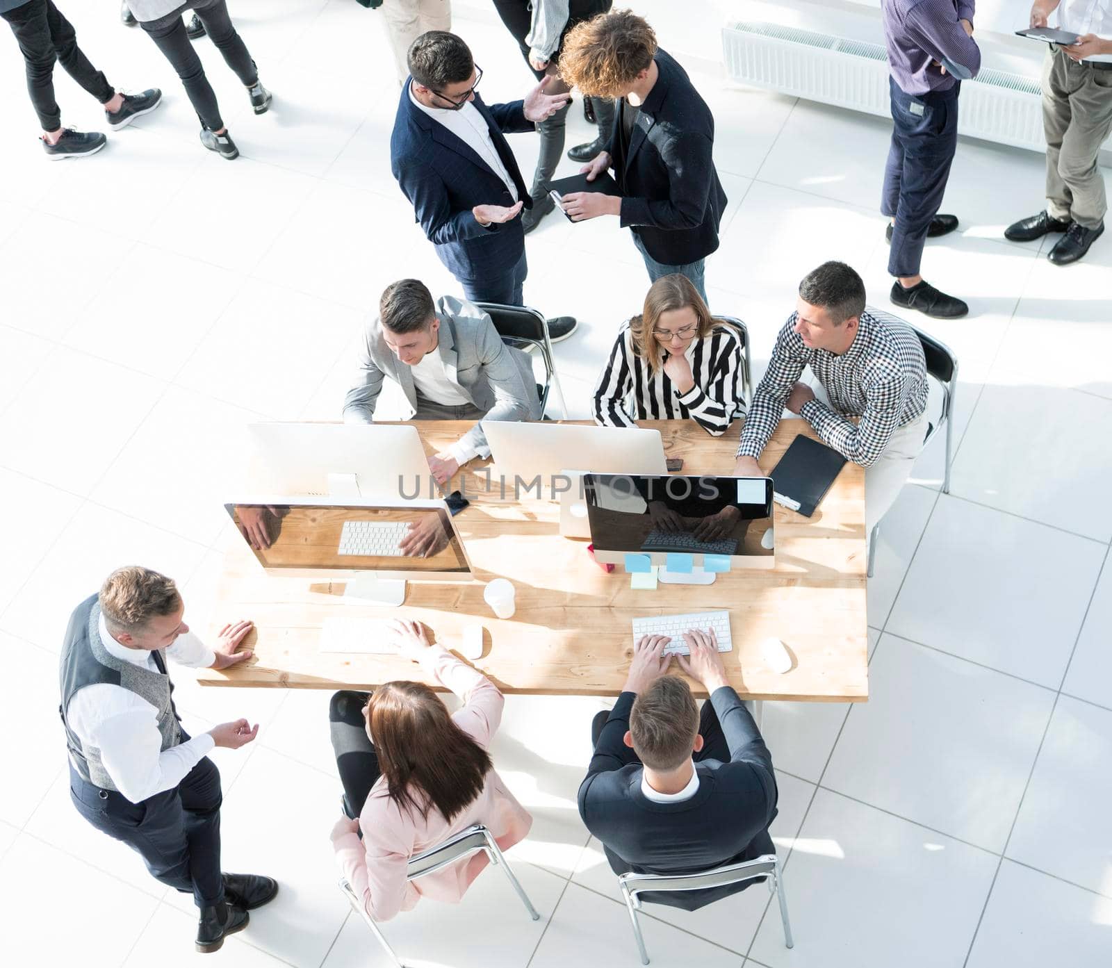 top view. business team operates in a modern office by asdf