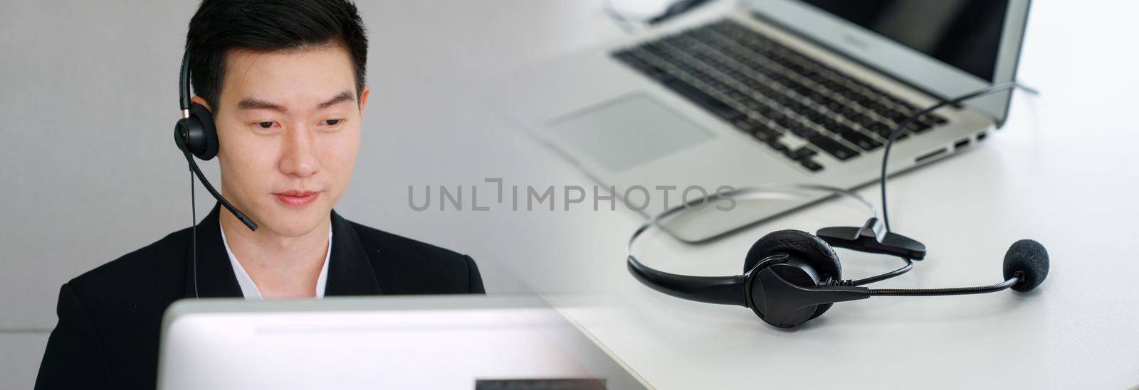 Business people wearing headset working in office in widen view by biancoblue