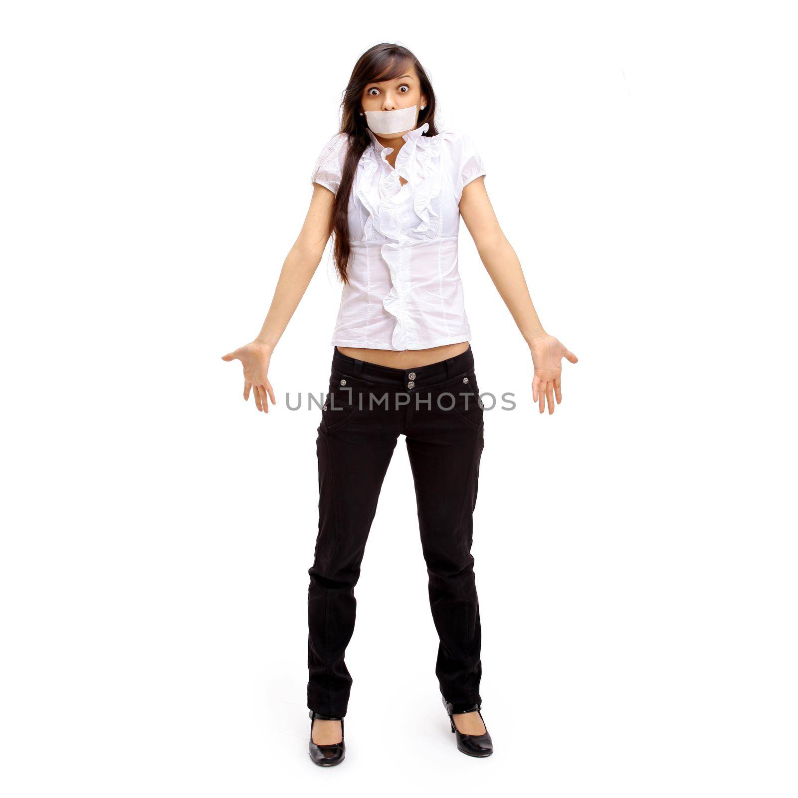 The beautiful business woman with the closed mouth on a white background