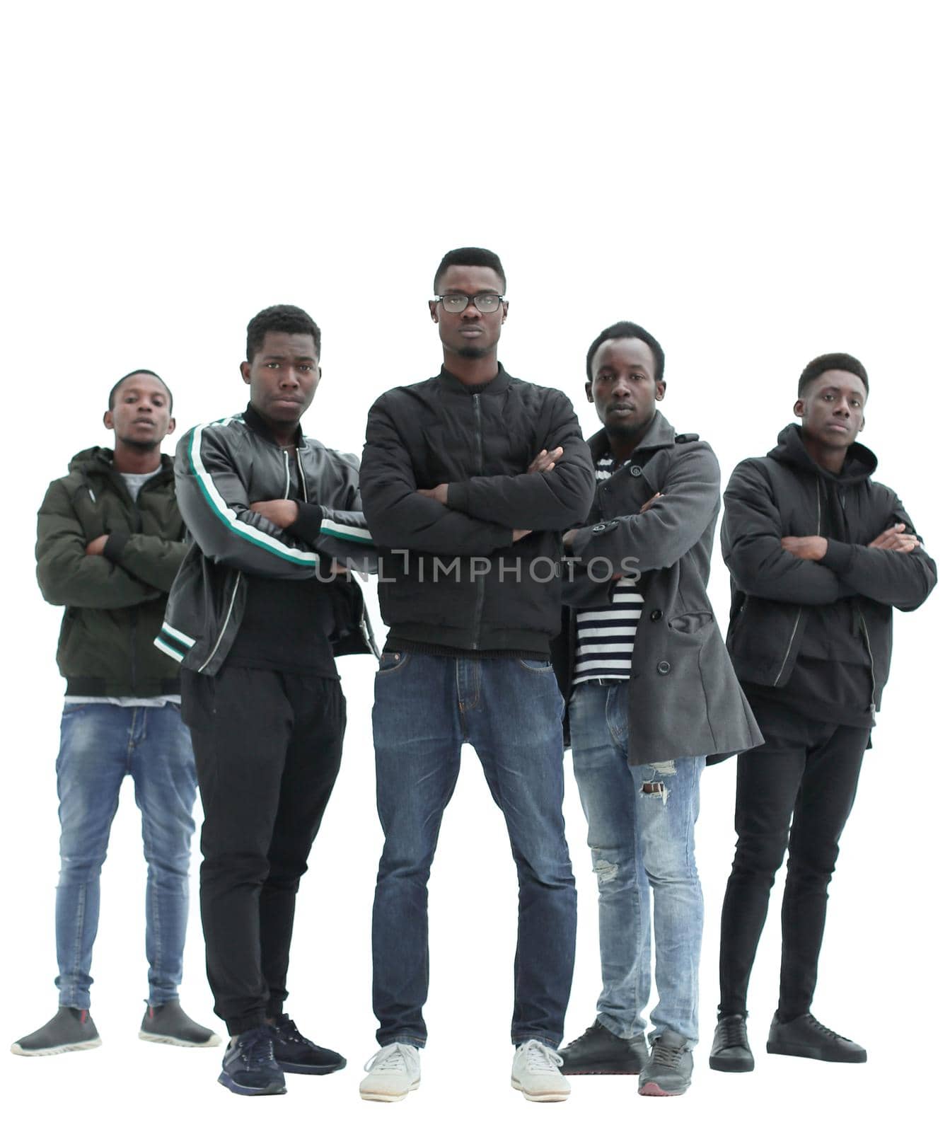 in full growth. a group of confident guys looking at the camera . isolated on white background