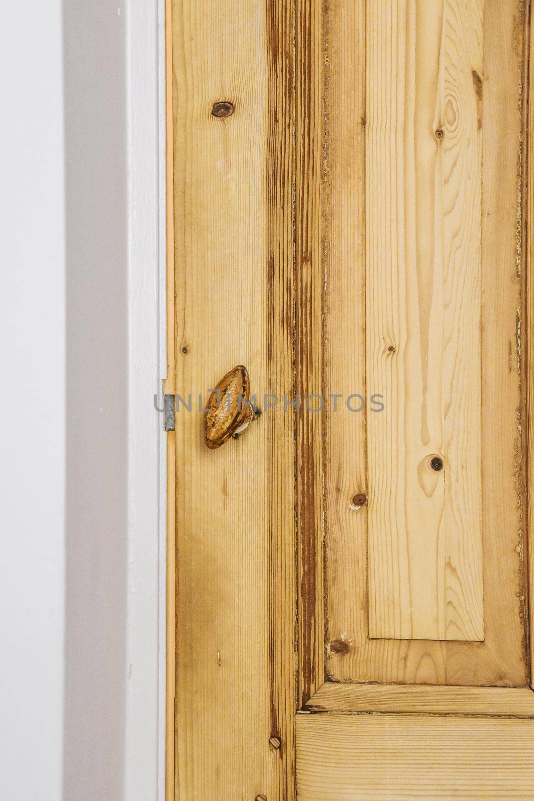 A wooden entrance door by casamedia