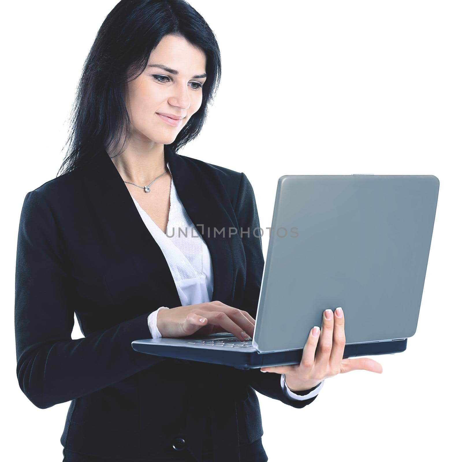 Businesswoman working at a laptop full length isolated, white background by SmartPhotoLab