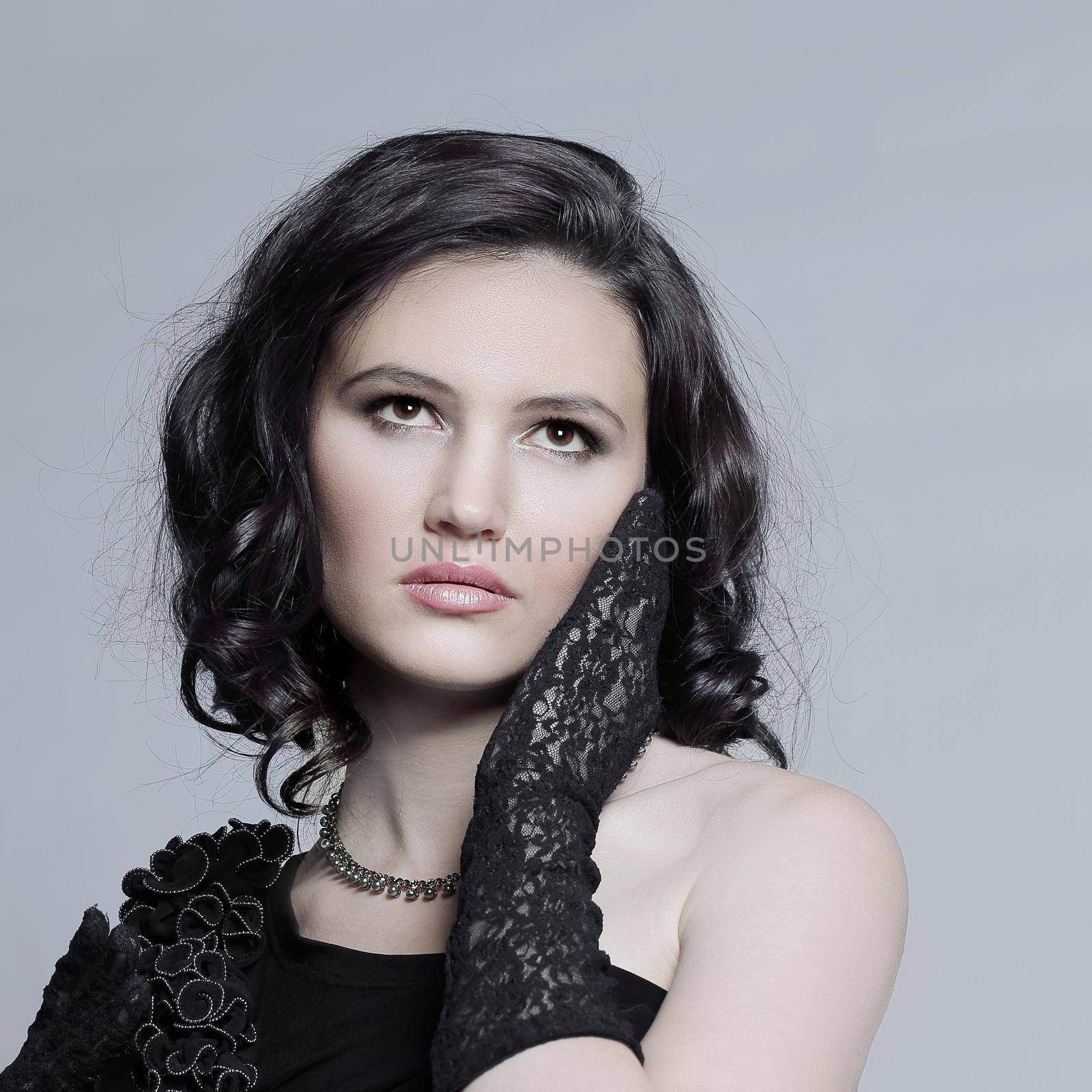 portrait of beautiful young woman in a black dress by SmartPhotoLab