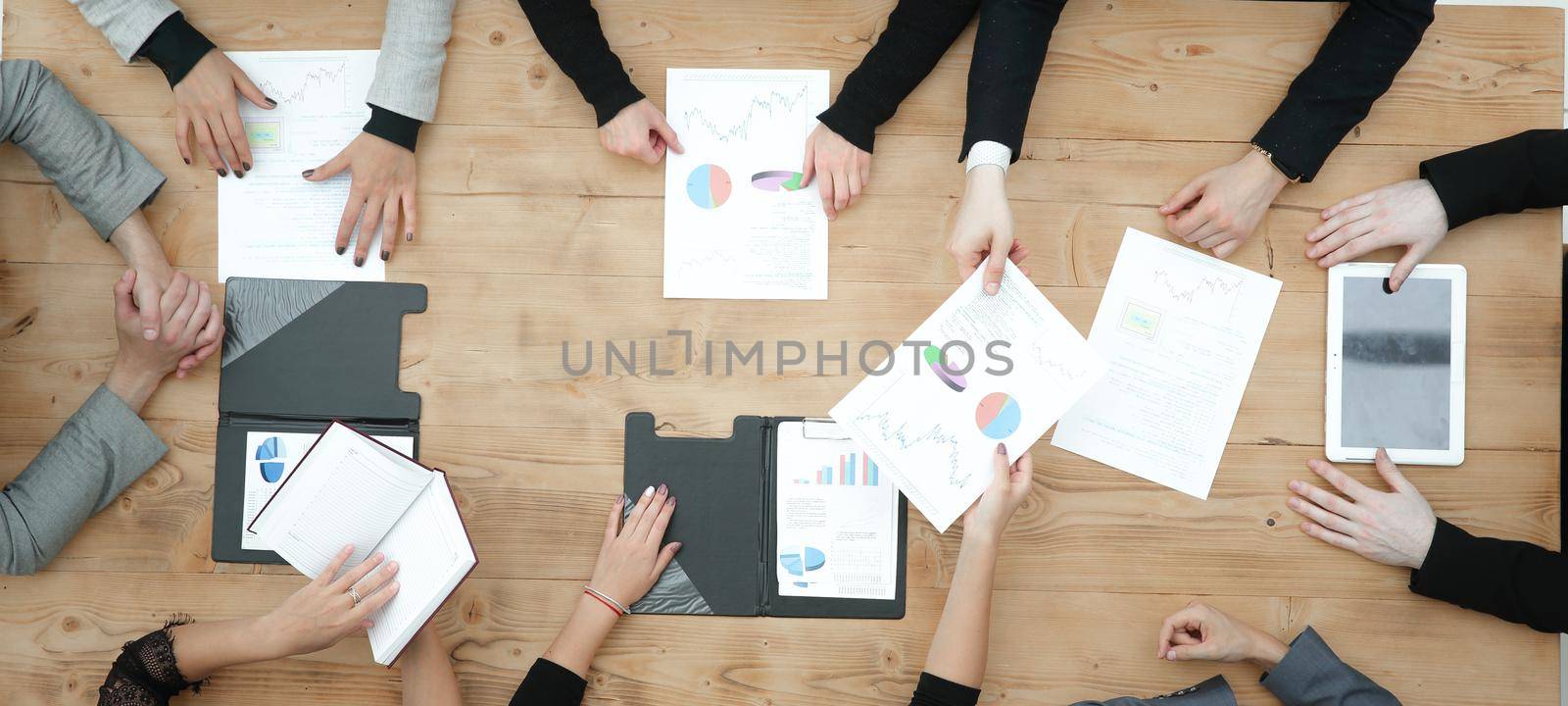 top view. business team works with business documents by asdf