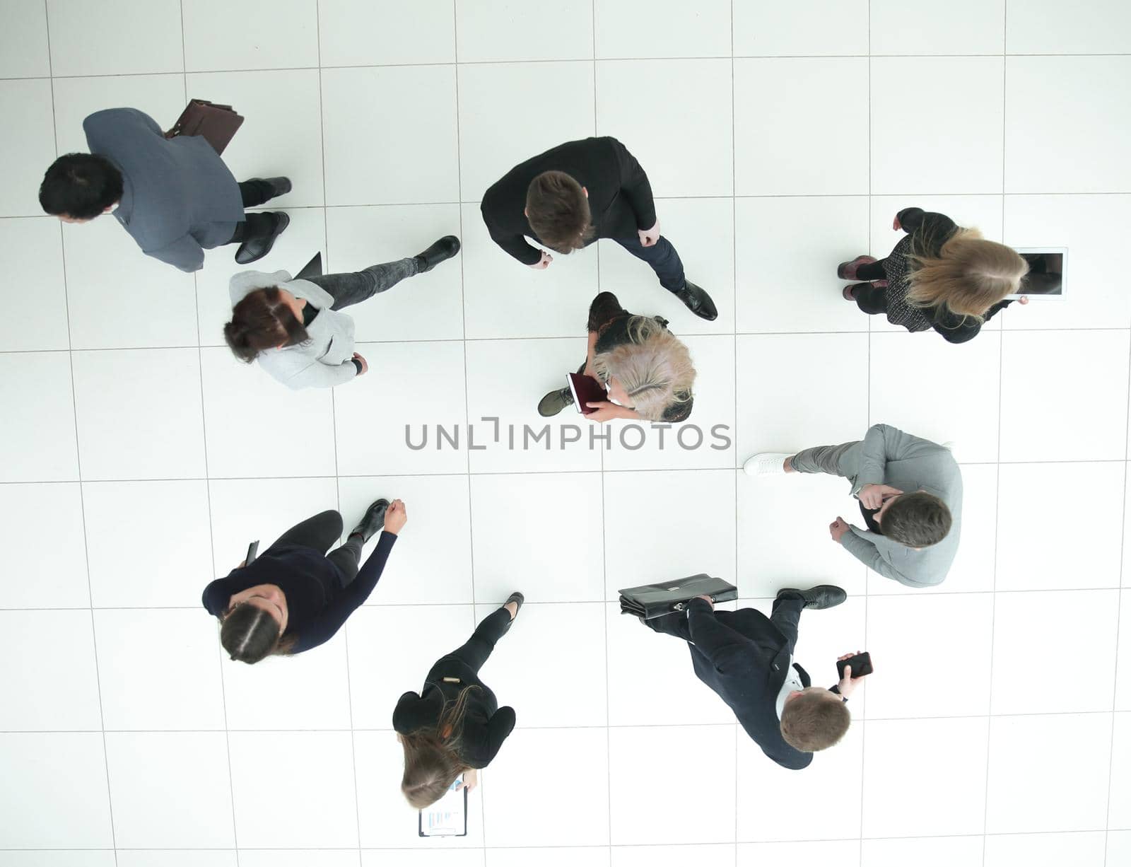 top view. group of serious diverse business people looking at the camera . business concept