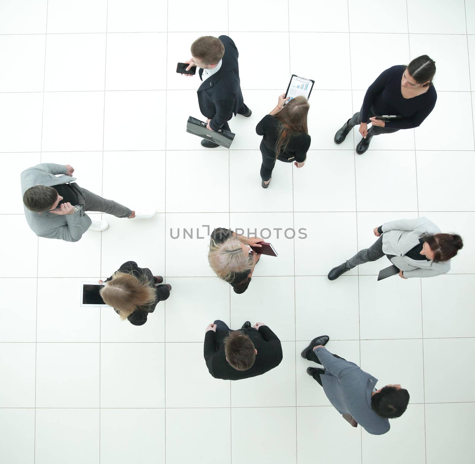 top view. group of serious diverse business people looking at the camera . business concept