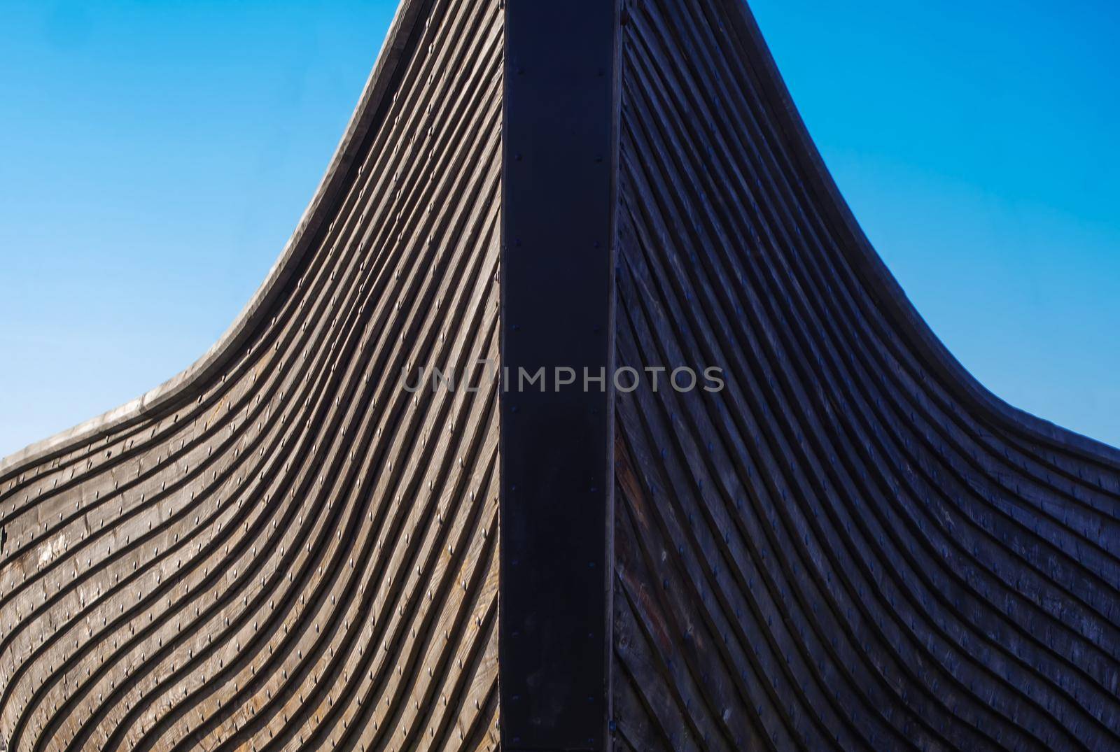 The nose of a wooden boat. Old Viking Drakkar