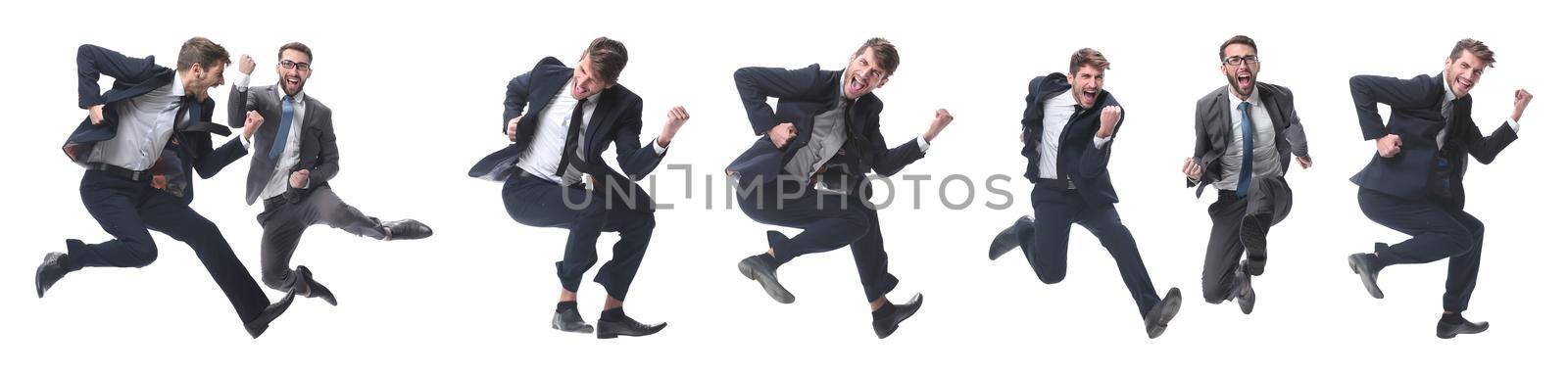 in full growth. two cheerful dancing business people. isolated on white background.