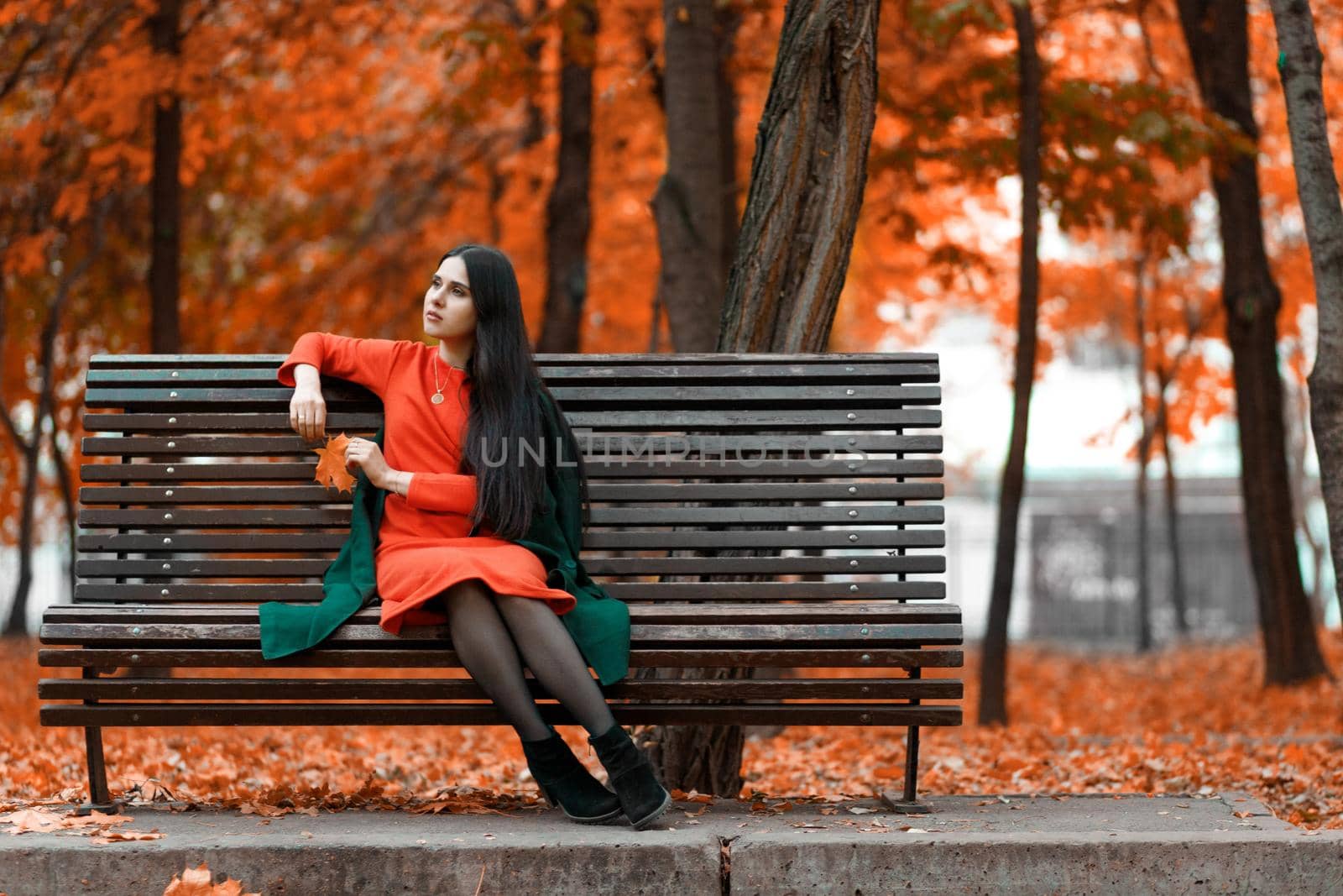 Beautiful young woman autumn mood outdoor portrait.
