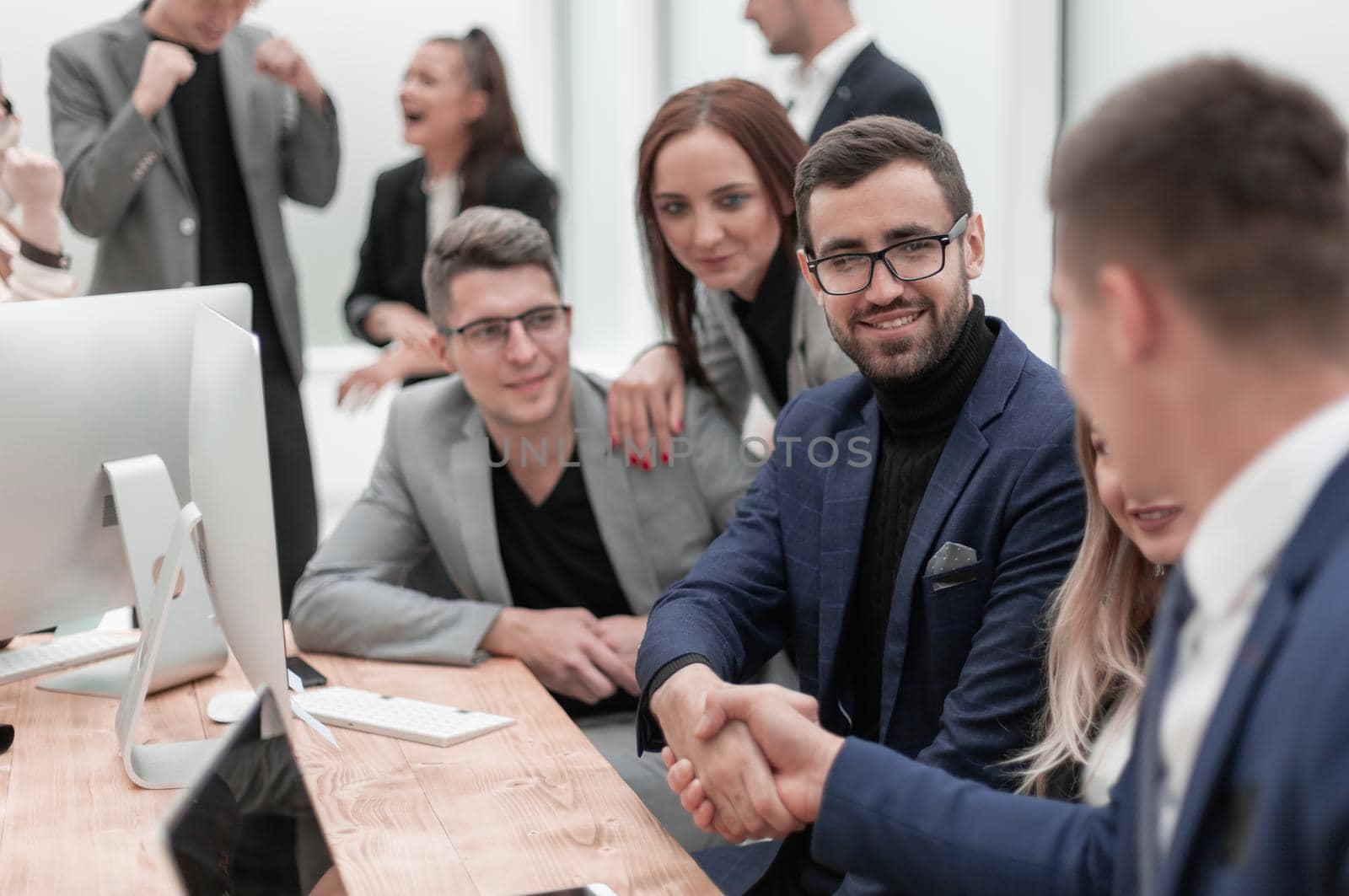 close up. business handshake during a work meeting. by asdf