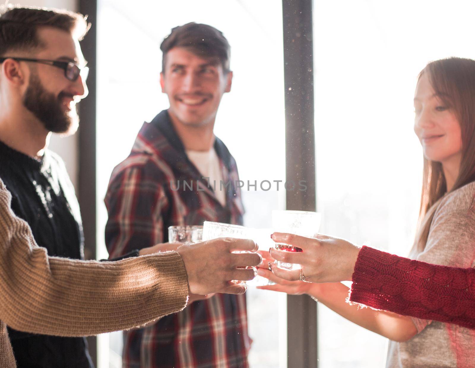 background image of a glass of juice in the hands of the young couple by asdf