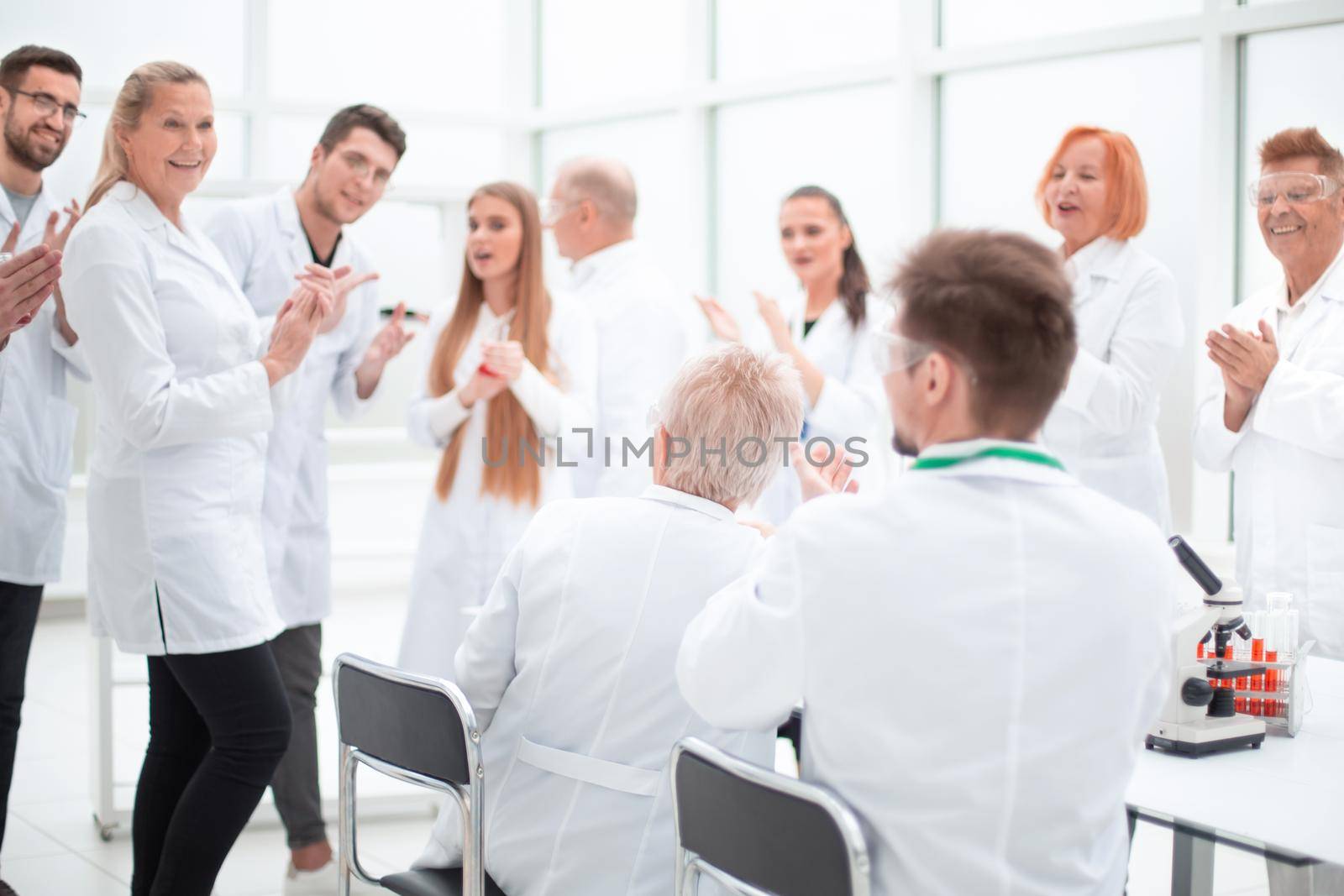 group of researchers discussing new ideas in the laboratory. photo with a copy-space