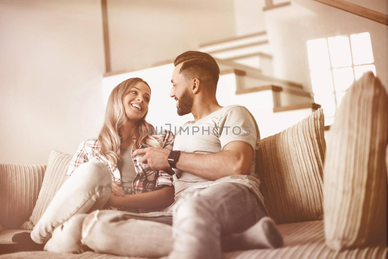 close up. loving couple sitting on sofa in cozy living room