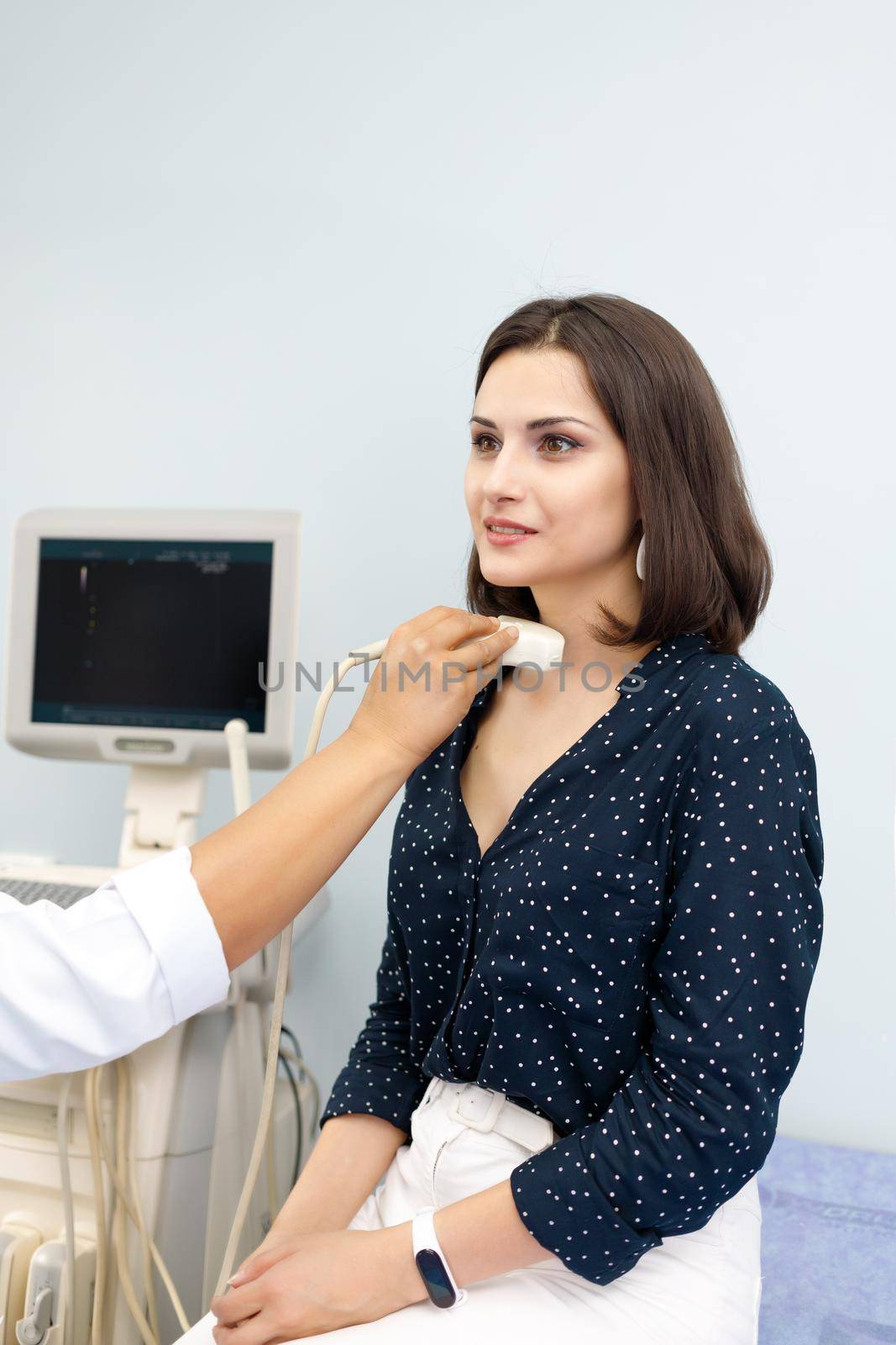 Routine medical ultrasound examination for cancer in the clinic, vertical.