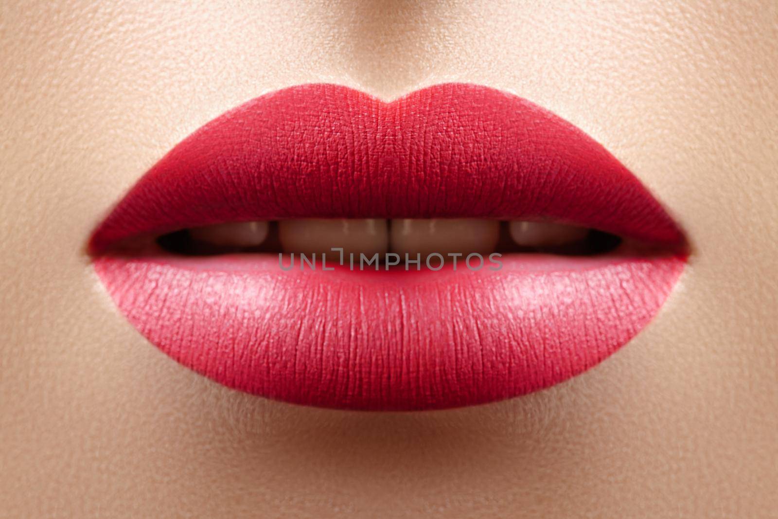 Beautiful Woman Lips with Red Fashion Lipstick Makeup. Cosmetic, Fashion Make-Up Concept. Beauty Lip Visage. Passionate kiss. Female Sexy Mouth