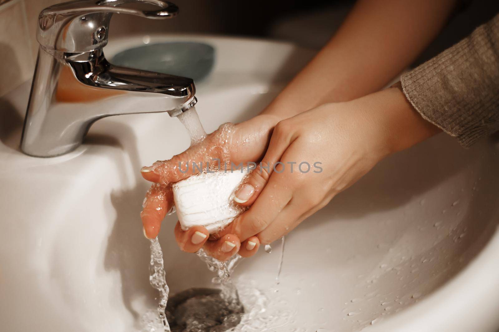 Washing of hands with soap under the crane with water. Hygiene hands in bathroom. Stop virus by MarinaFrost