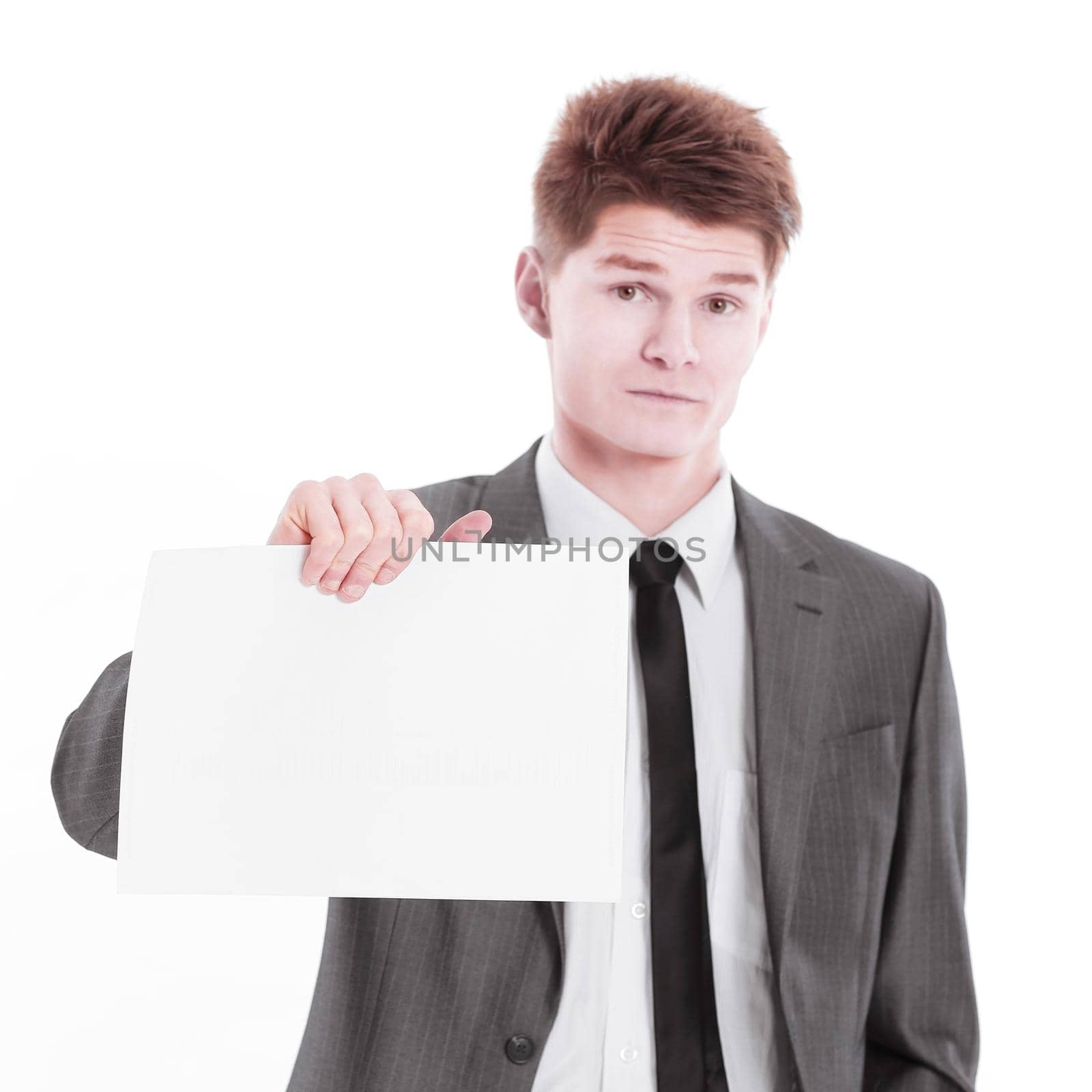 young businessman showing a blank sheet.isolated on a white background