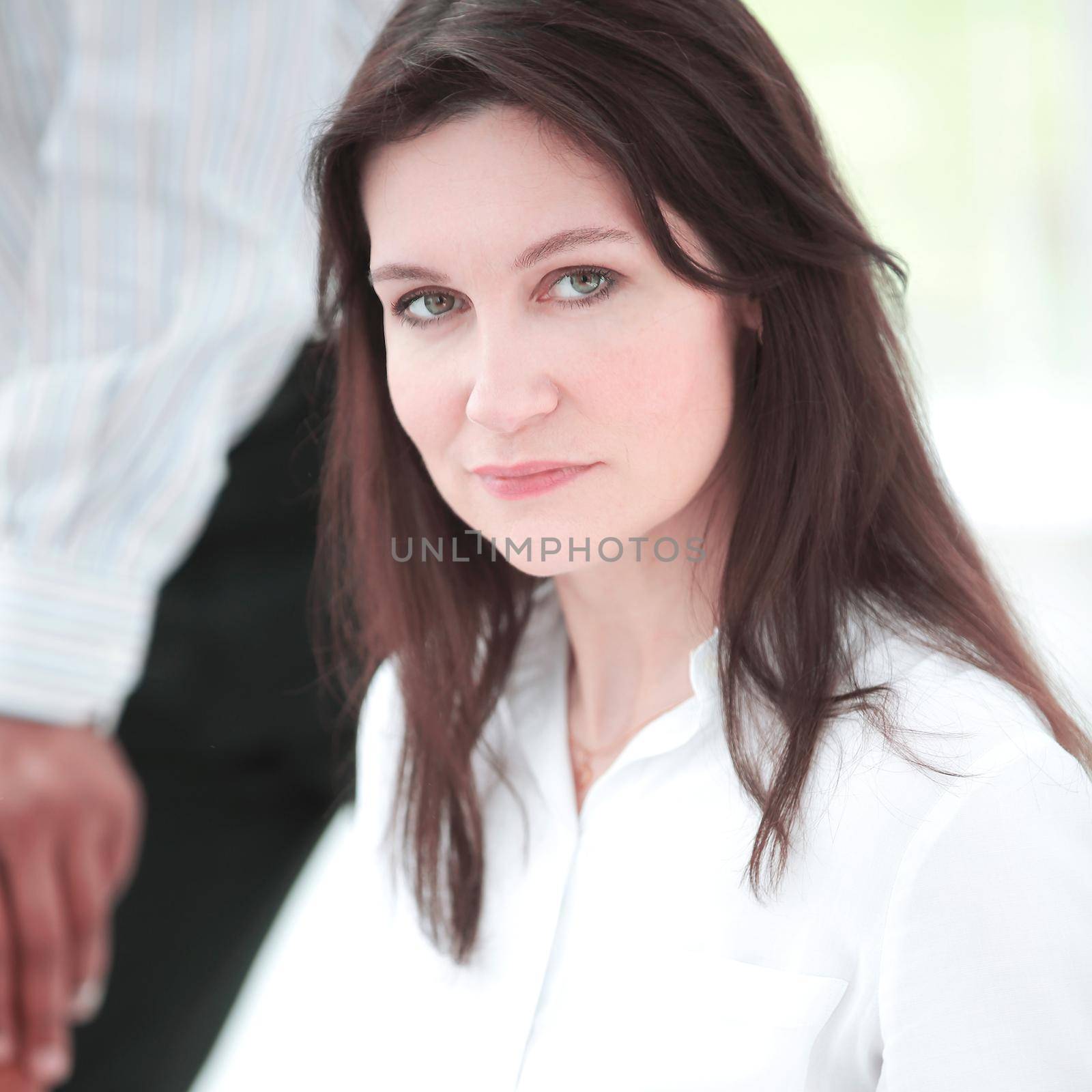 portrait of a serious successful business woman by SmartPhotoLab