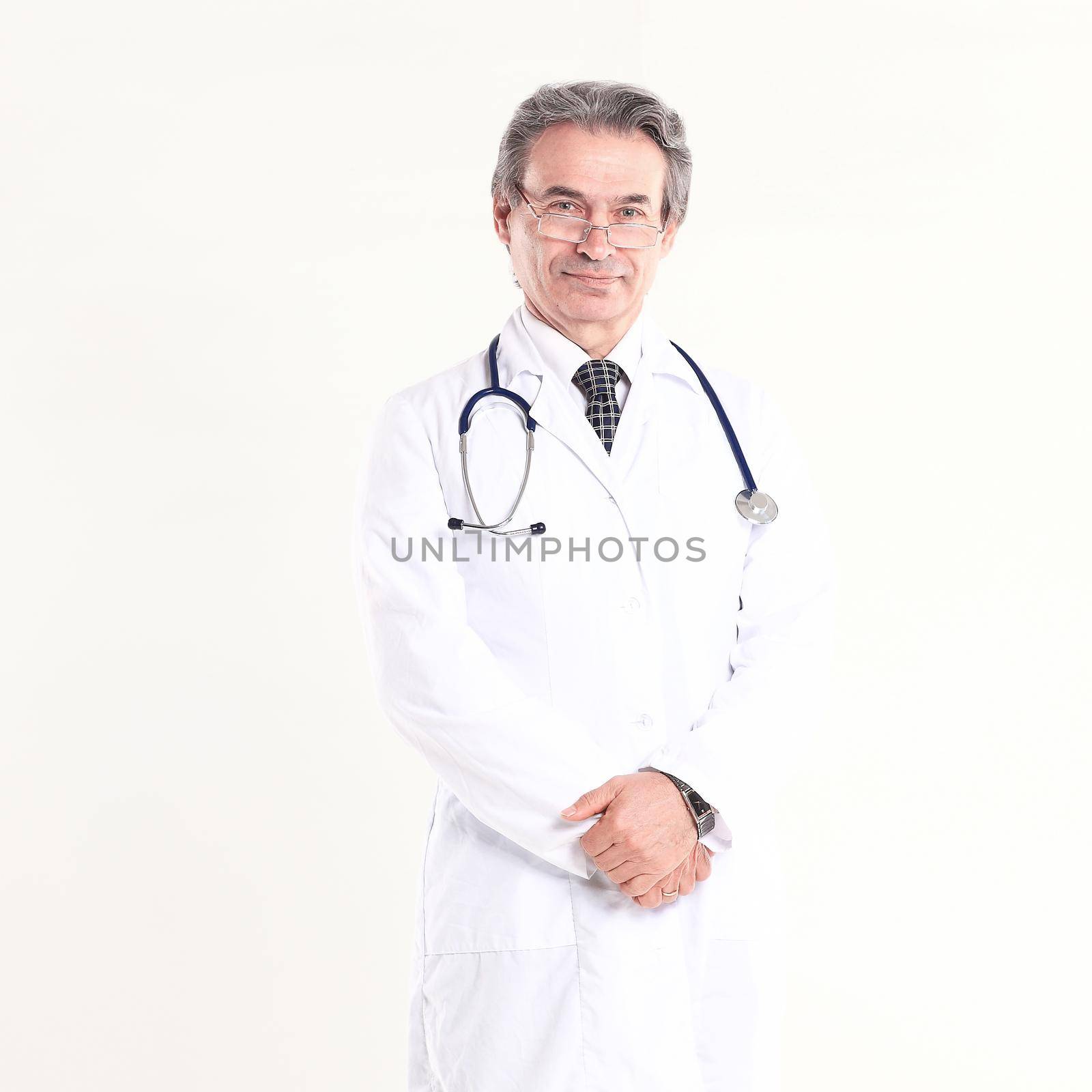 in full growth.experienced physician with stethoscope .isolated on white background.