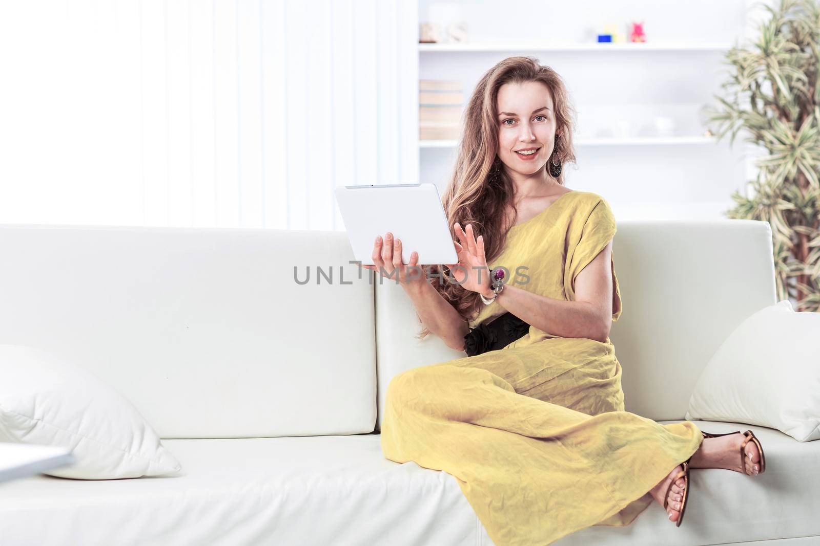 business woman with tablet. communication and the Internet .work on the Internet.