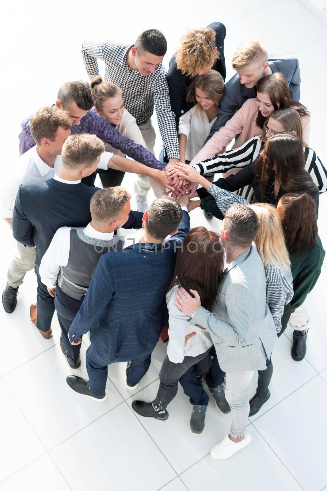 top view. group of young business people showing their unity. concept of team building