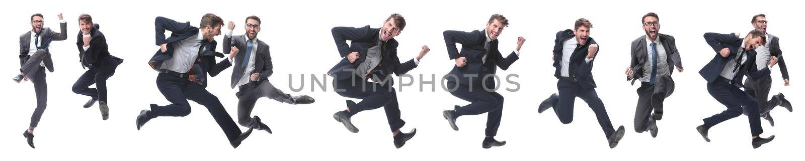 in full growth. two cheerful dancing business people. isolated on white background.