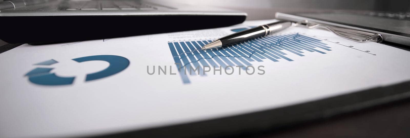 close up. workplace businessman on a black background by SmartPhotoLab