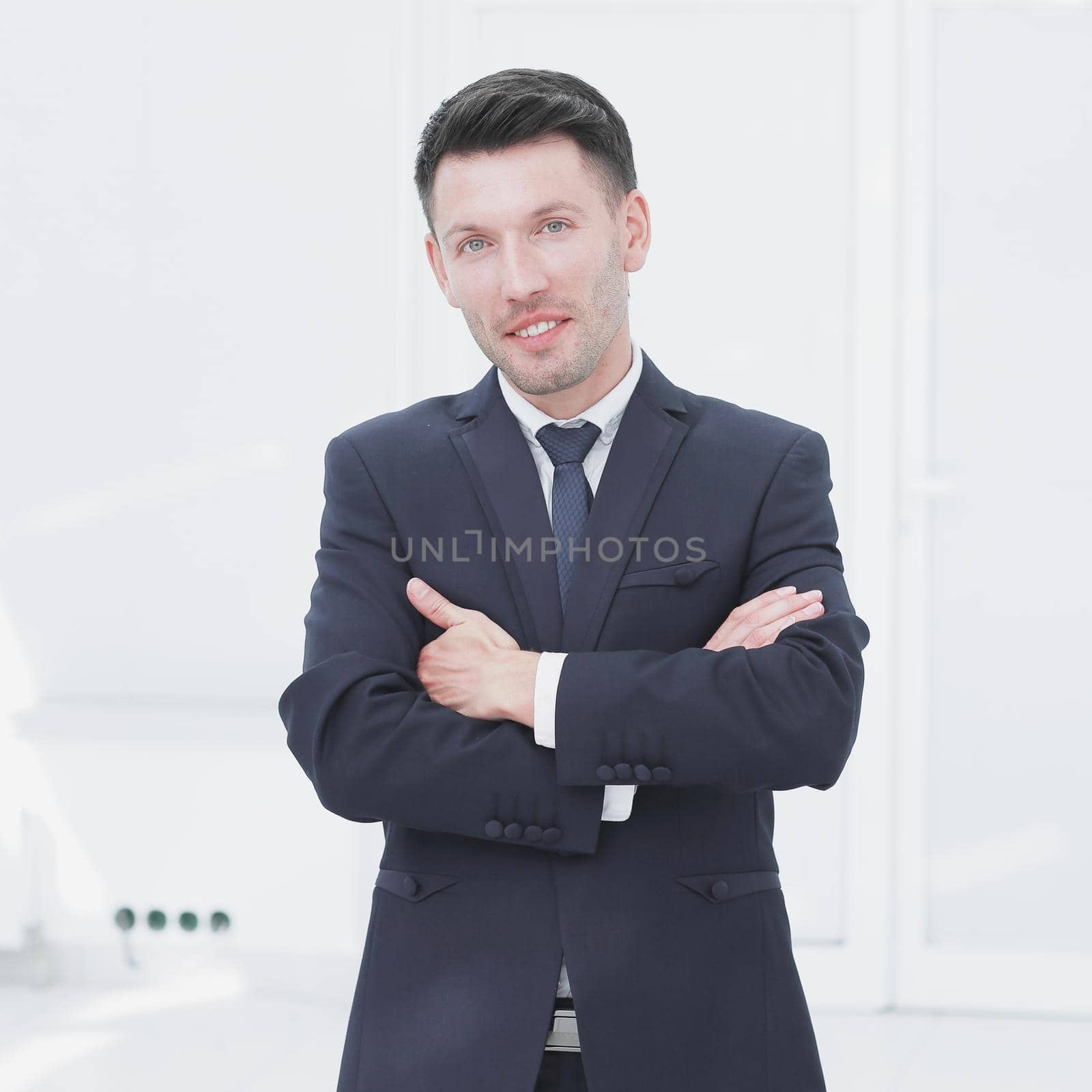 close up.portrait of confident businessman on blurred office background.