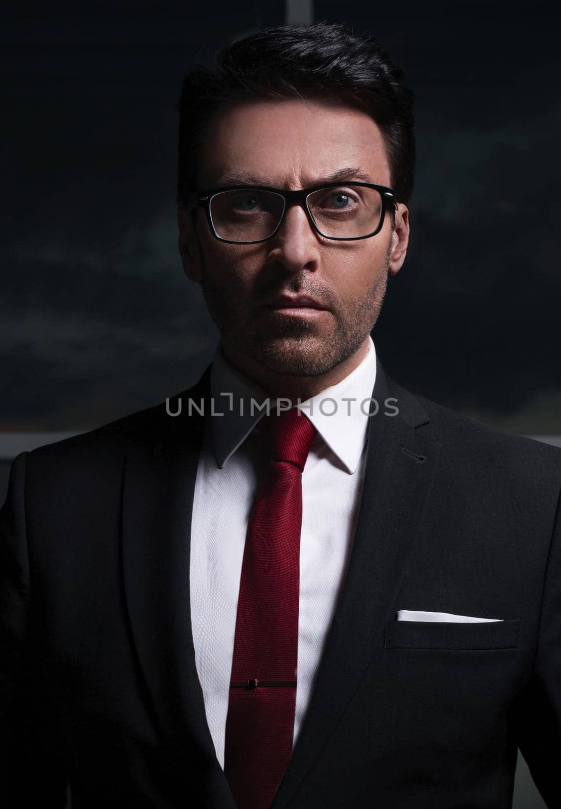 close up.portrait of a serious businessman by asdf