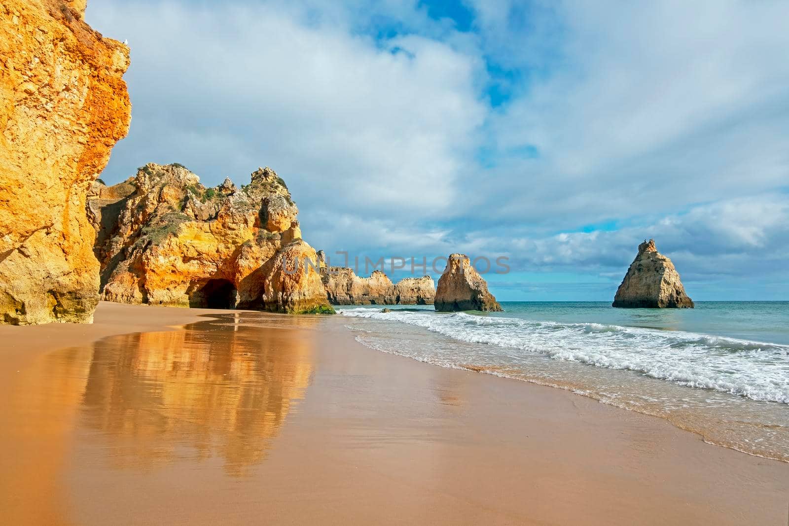 Natural rocks at Praia Tres Irmaos in Alvor in the Algarve Portugal