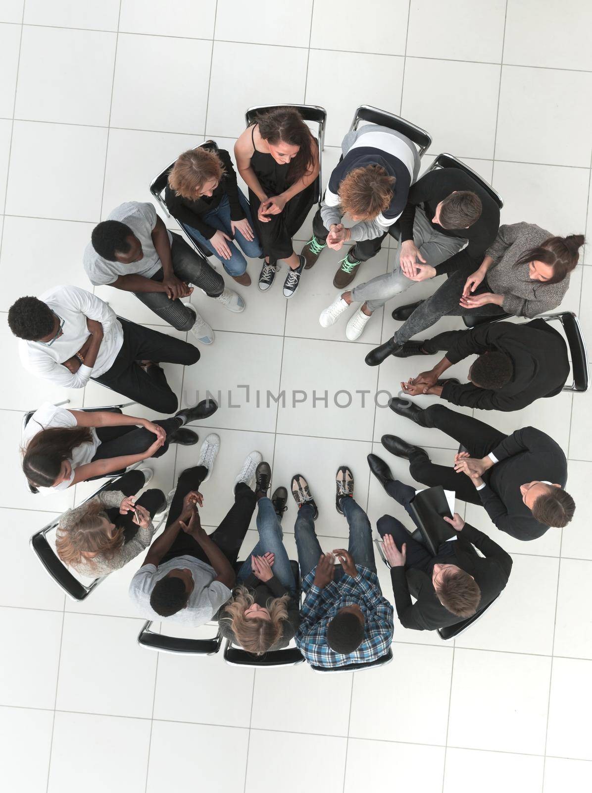 Business meeting concept with people sitting around a round tabl by asdf