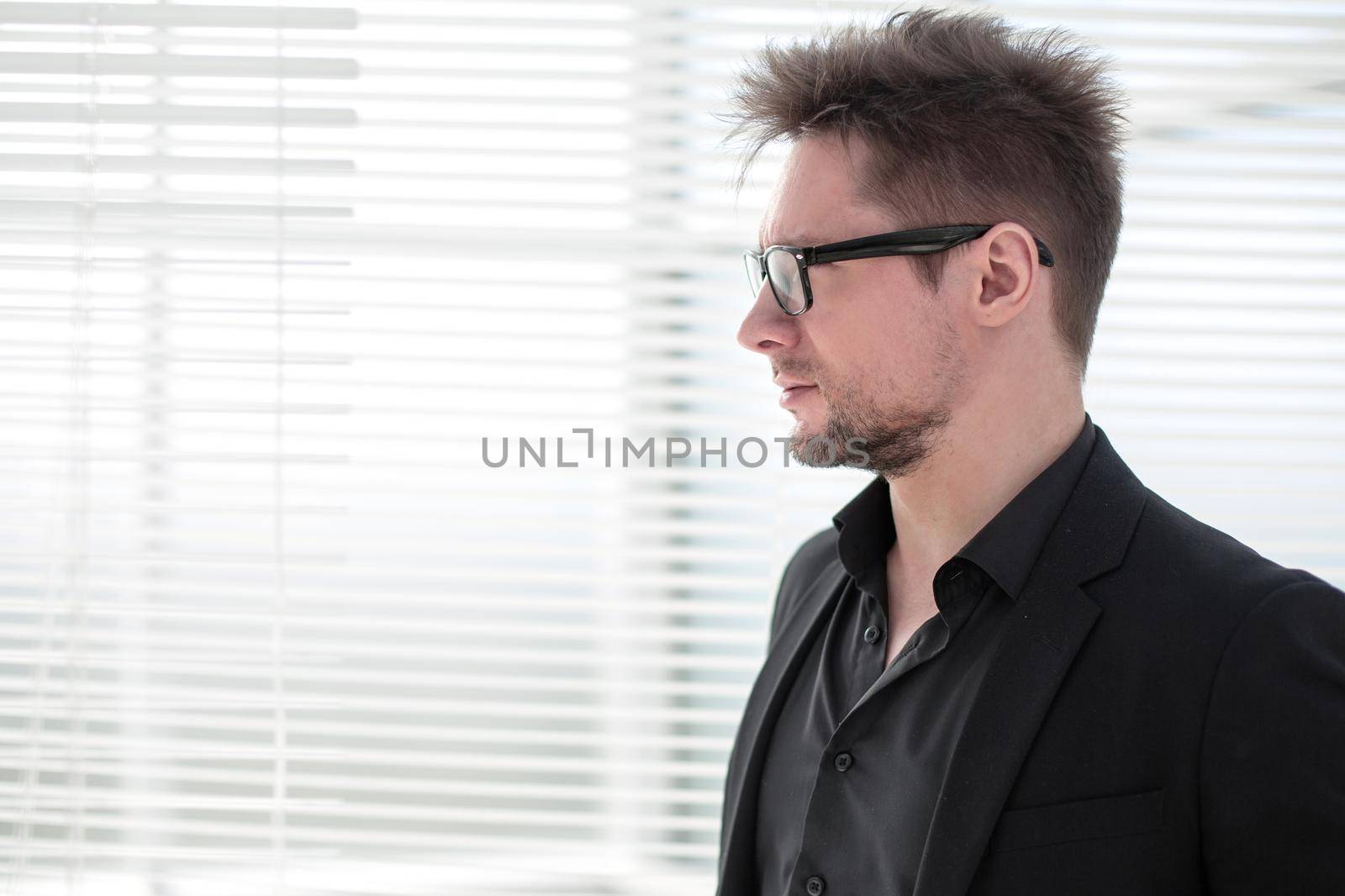 Elegant male model look in distance, side profile image