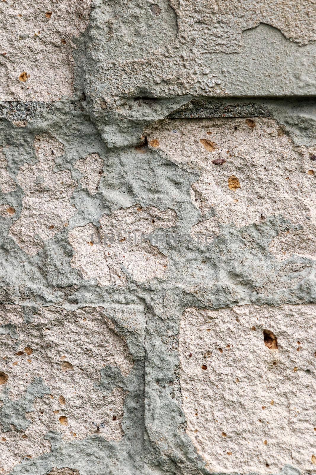 White grungy bricks background in close up by Lincikas