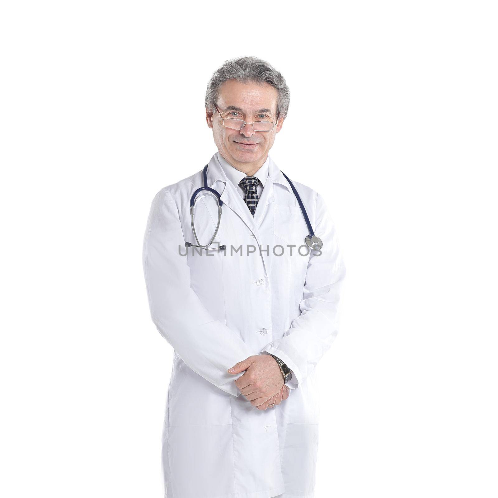 in full growth.experienced physician with stethoscope .isolated on white background.