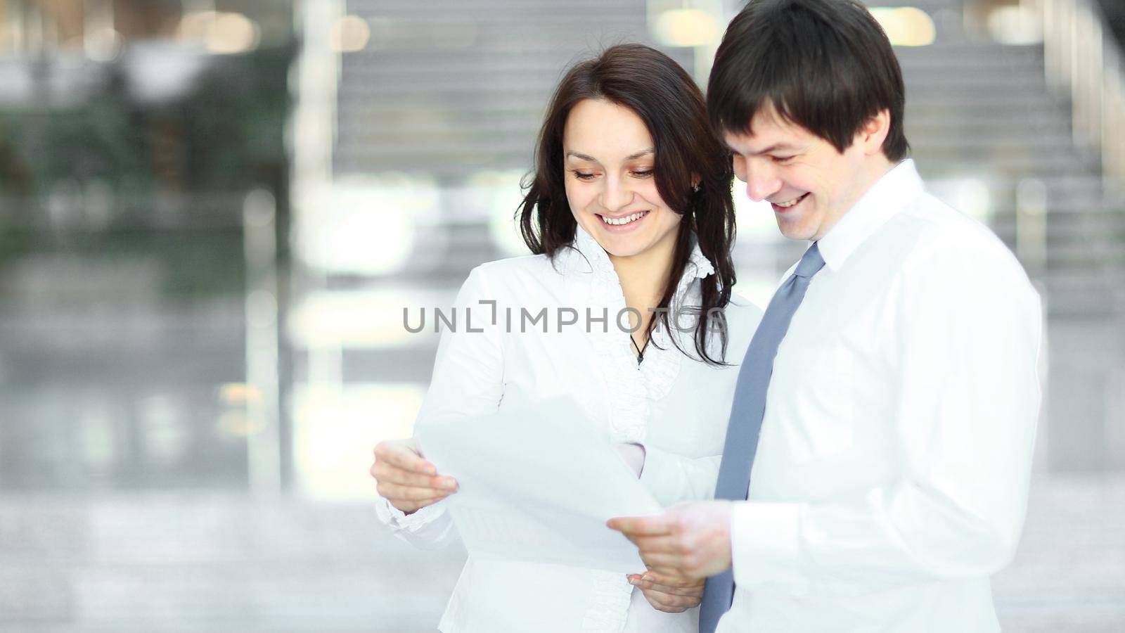 closeup. business people discussing business documents. photo with copy space by SmartPhotoLab