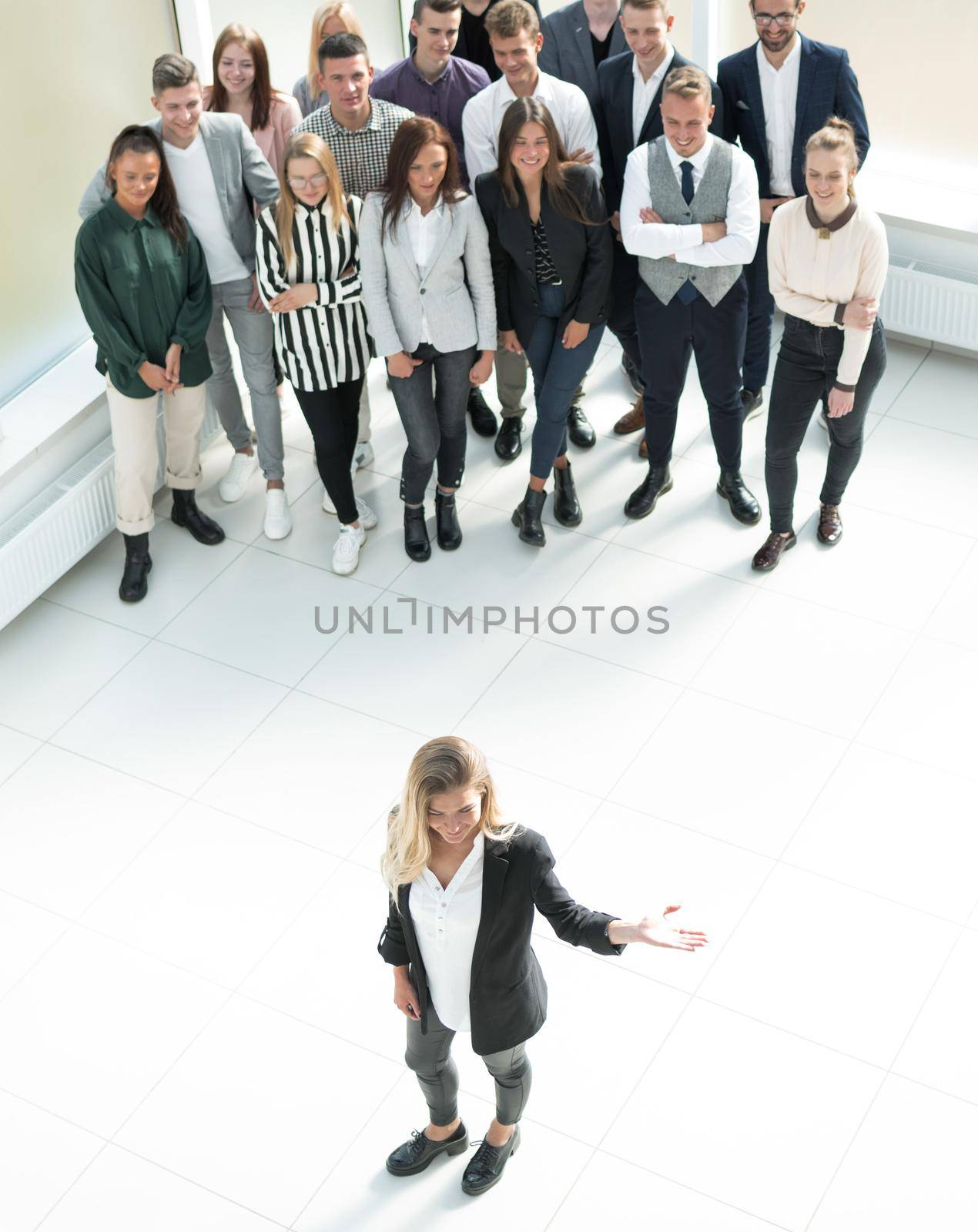 top view. female leader standing at the front of the business team by asdf