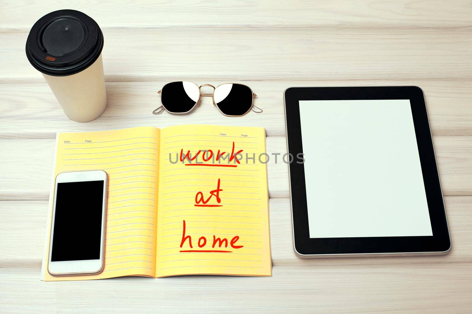 Work at Home. Perfect Minimal Work Desk with Smartphone, Note and Morning Coffee. Office Freelancer Table. Stylish Work Place with necessary Accessories