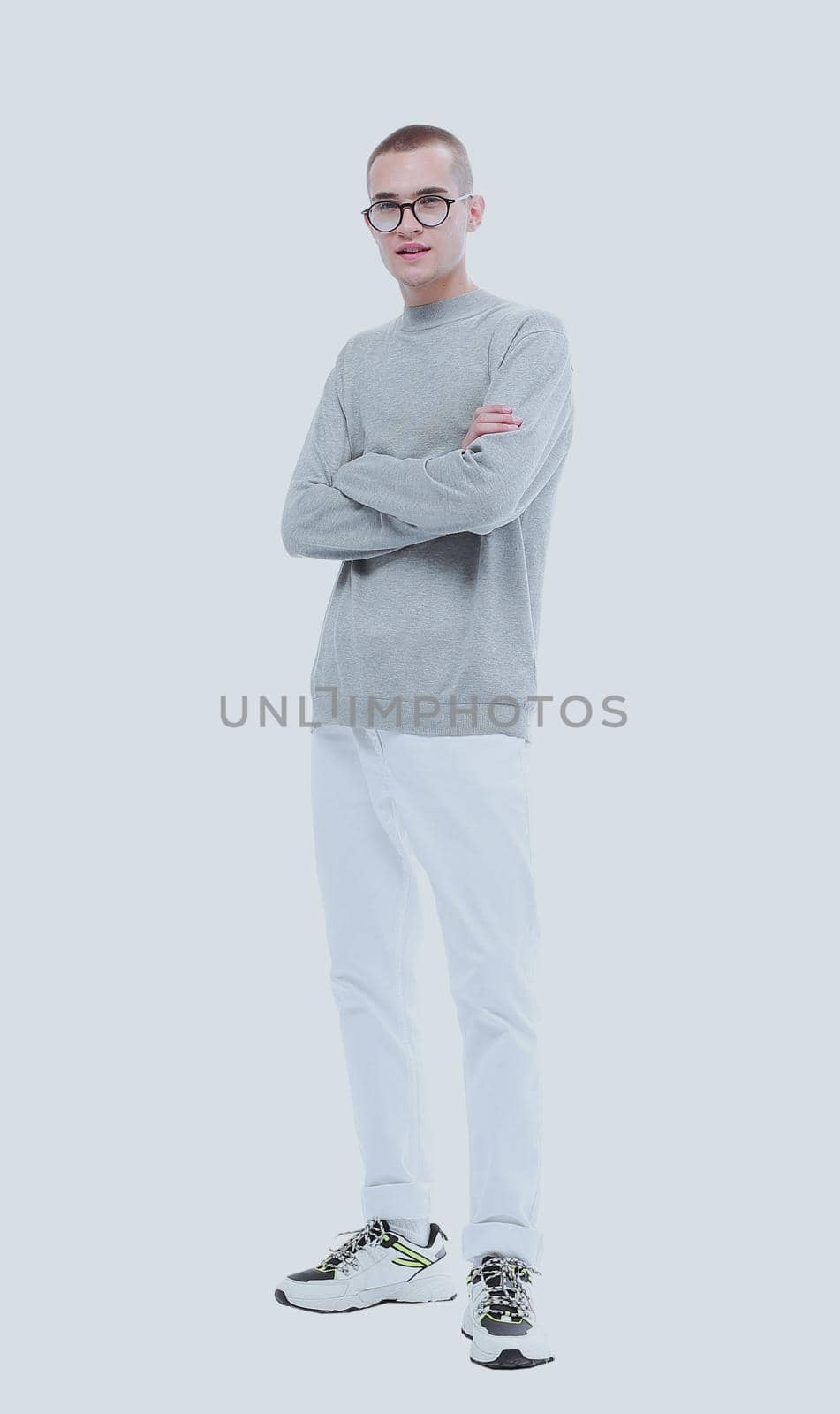 in full growth. casual stylish guy in glasses. isolated on white background