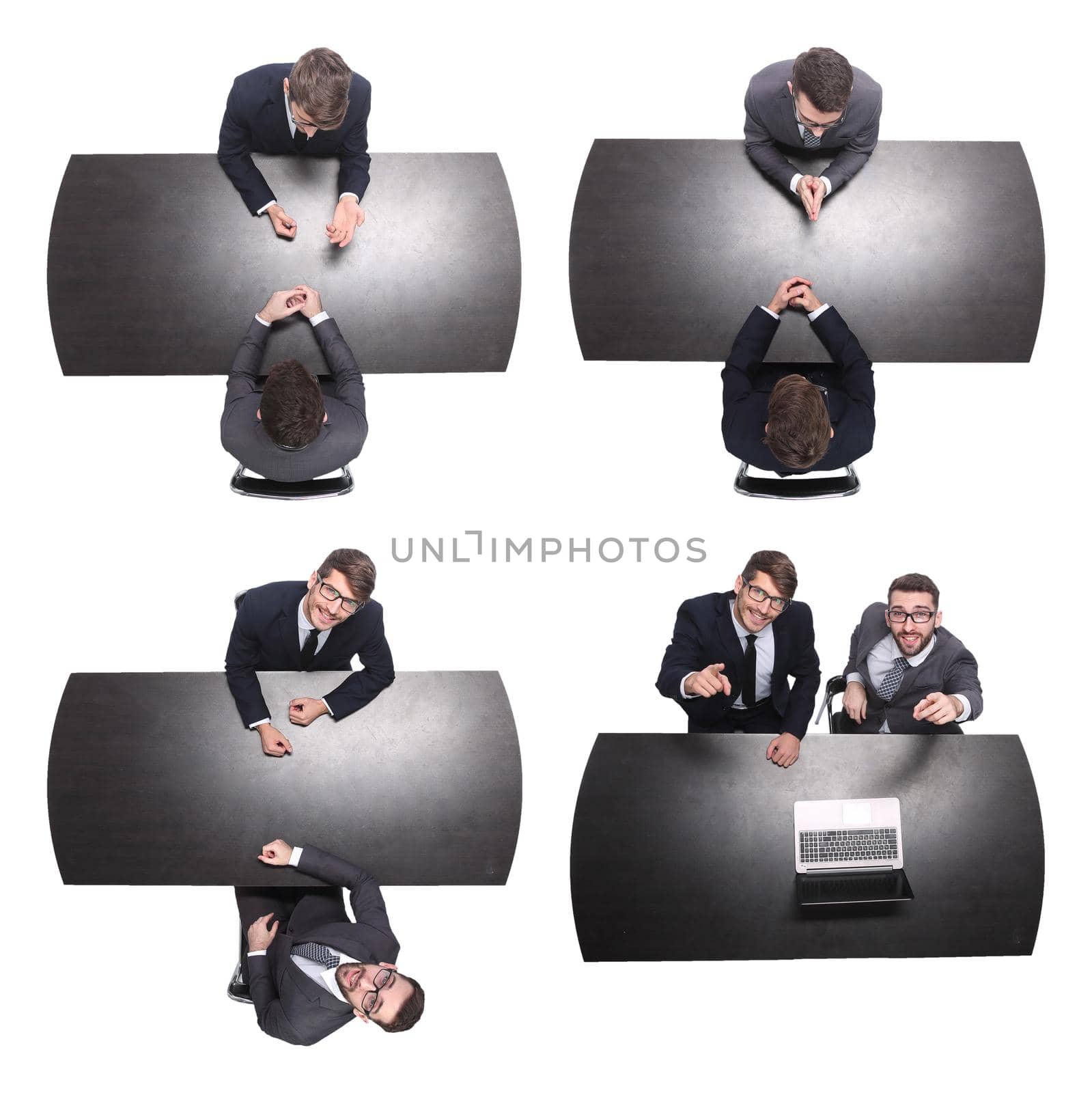 top view. two business people sitting at the Desk. isolated on white background