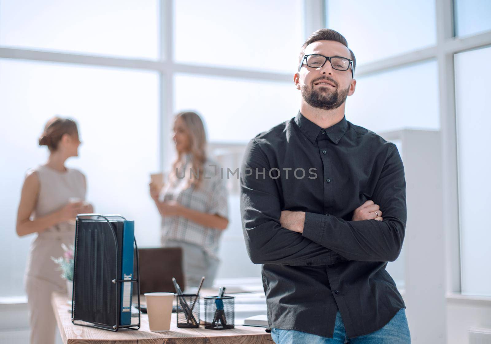 project Manager and working group standing in office . office weekdays